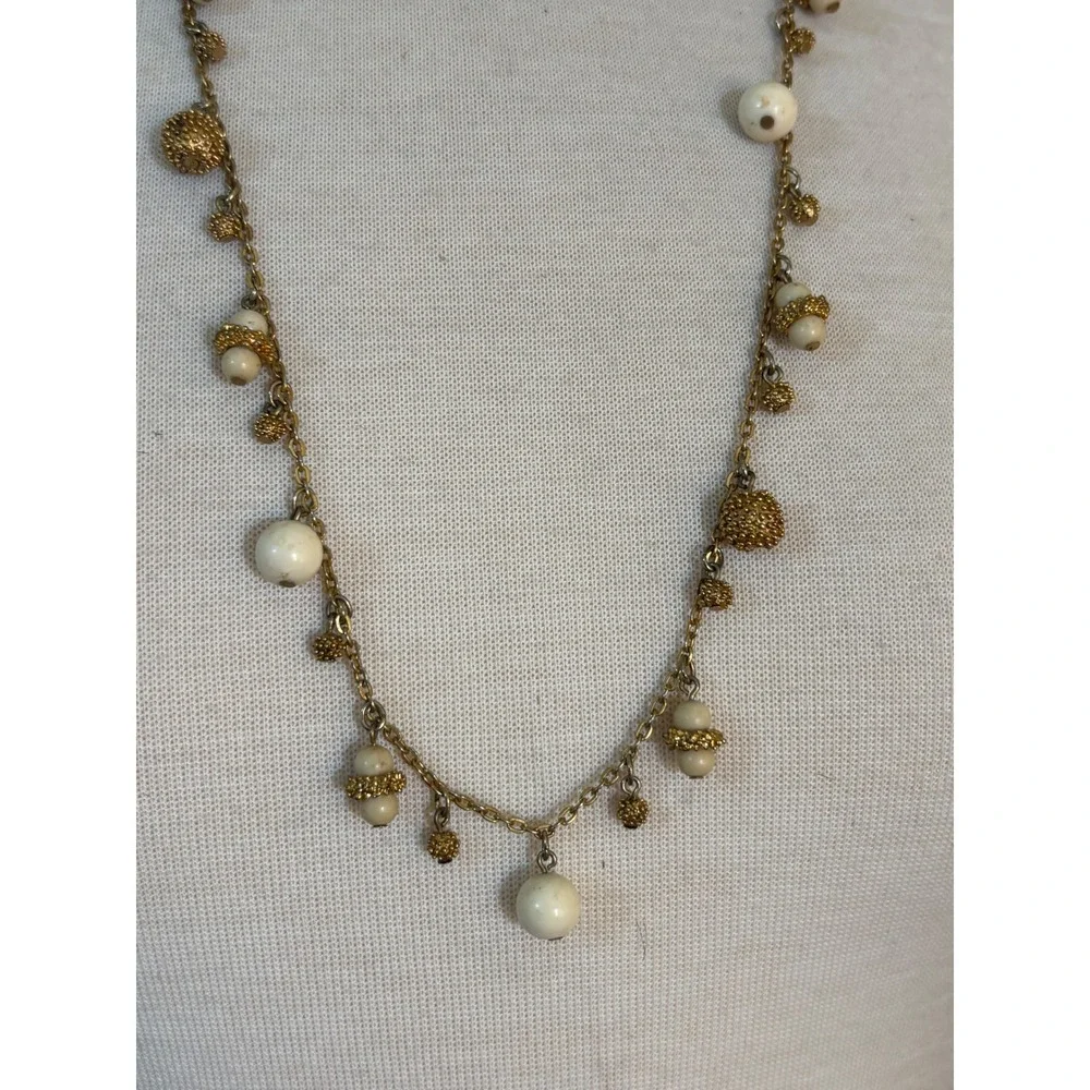 Gold Tone Station Necklace Cream Beads Textured Filigree Accents 30 Inch